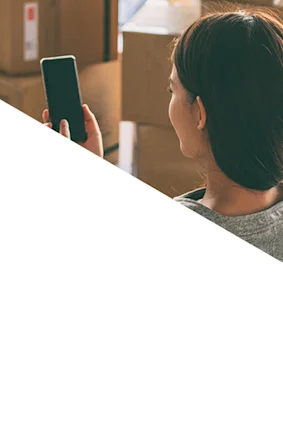 lady unpacking on phone