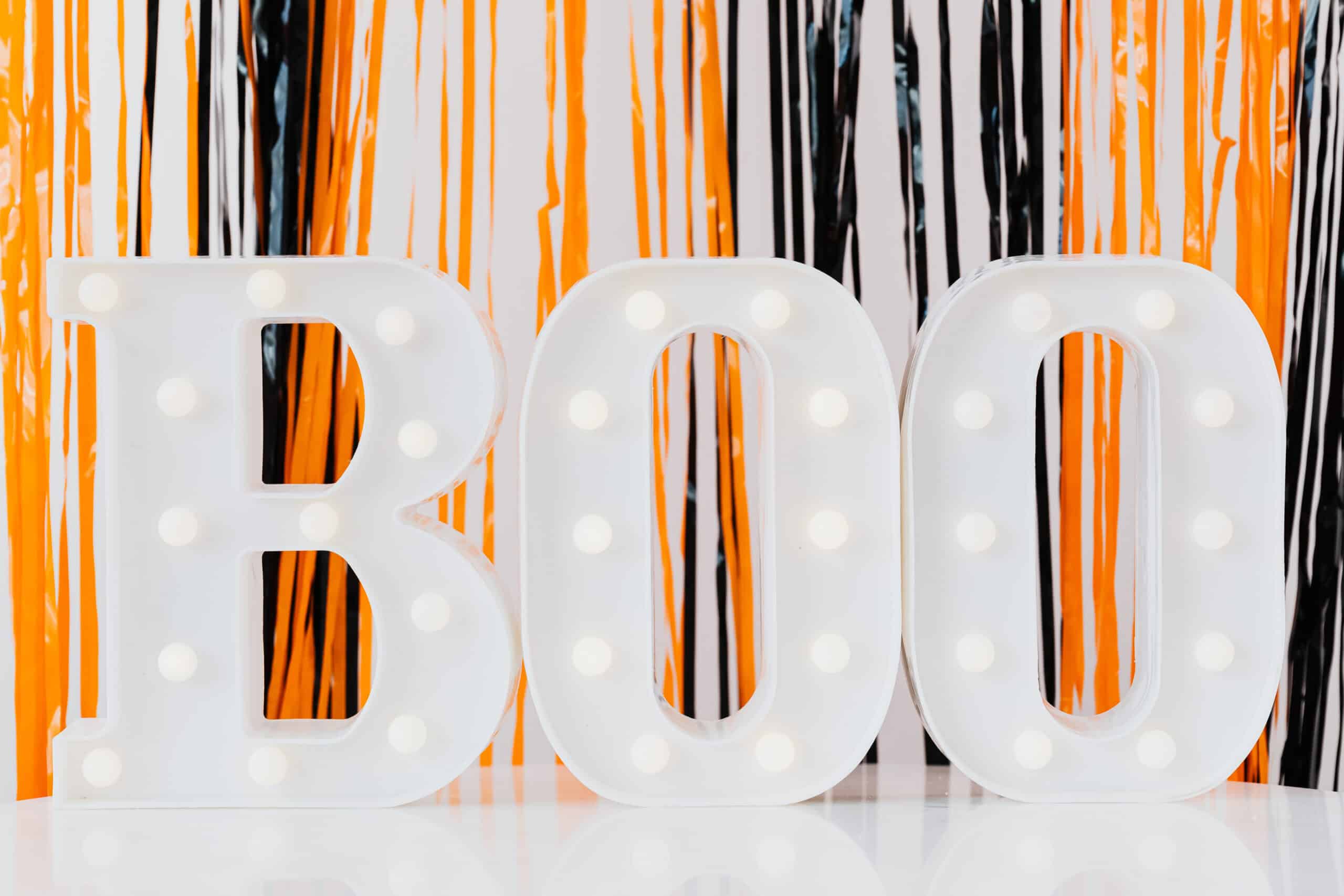 boo Boo! with black and orange streamers